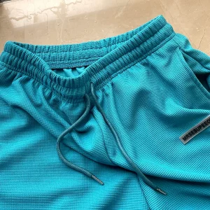 Hong Kong style waffle simple solid color all-match loose casual shorts men's couple beach sports basketball pants five-point pants – Image 5